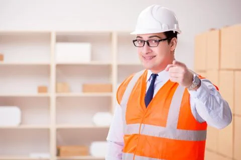 Man working in postal parcel delivery service office 스톡 사진