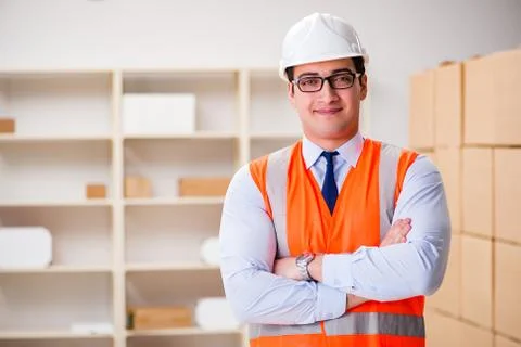 Man working in postal parcel delivery service office 스톡 사진