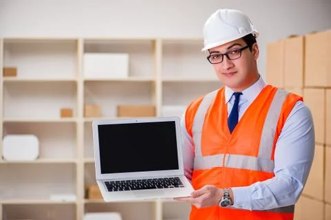Man working in postal parcel delivery service office 스톡 사진