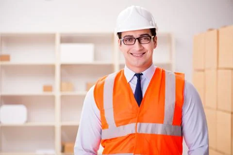 Man working in postal parcel delivery service office 스톡 사진