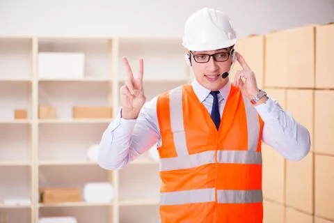 Man working in postal parcel delivery service office 写真素材