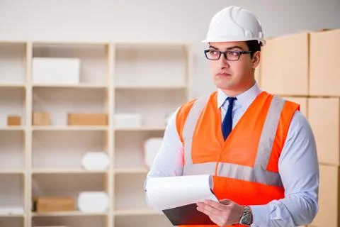 Man working in postal parcel delivery service office 스톡 사진