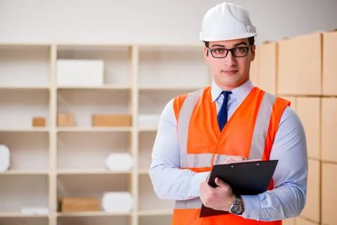 Man working in postal parcel delivery service office 스톡 사진