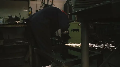 A man working with a power saw Stock Footage 61346592