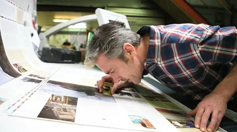 Man working in printing house Stock Footage 59777214