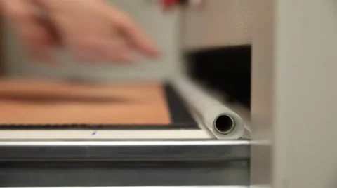 Man working on printing machine in print factory Stock Footage 66605725