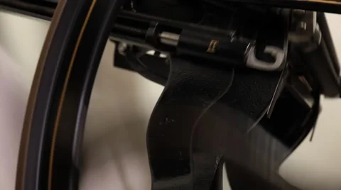 Man working on a printing press Stock Footage 66606900