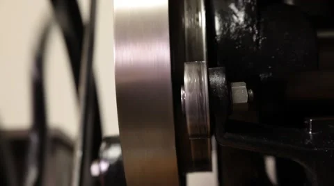 Man working on a printing press Stock Footage 66606954