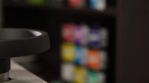 Man working on a printing press Stock Footage 66607297