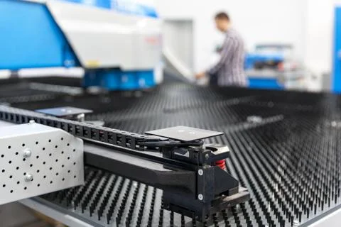 Man working at programmable machine Stock Photos