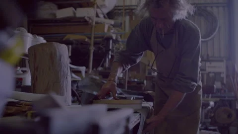 Man working on a project in a workshop Stock Footage 278991553