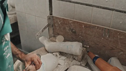 Man Working On Prosthetic Limb Socket | Stock Video | Pond5