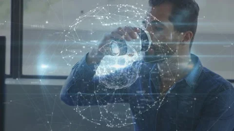 Man working reaching for takeaway cup, sipping and adjusting lid while tech Stock Footage 321824118