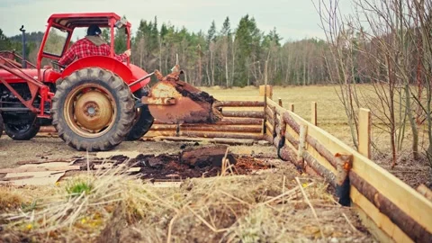 Man Working with Red Tractor - Farm Field Video stock 344954325