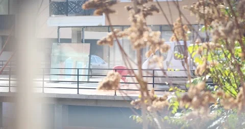 Man working in a red uniform. 4K Video Video stock 166870360