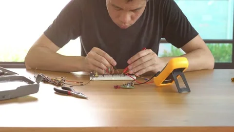 A man is working on a remote control drone Stock Footage 314899527