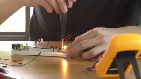 A man is working on a remote control drone Stock Footage 314899541