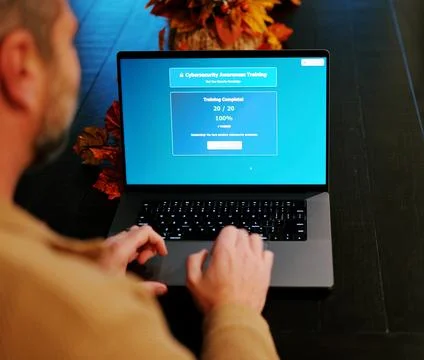 Man Working Remote -IT Security Awareness Training Stock Photos