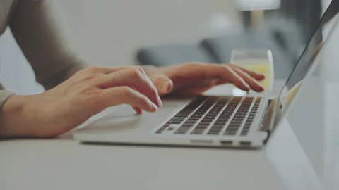 Man working remotely on a laptop Stock Footage 234347245