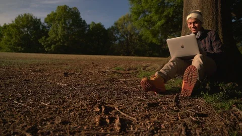 Man Working Remotely In The Park Using Laptop - 96 Video stock 106274207