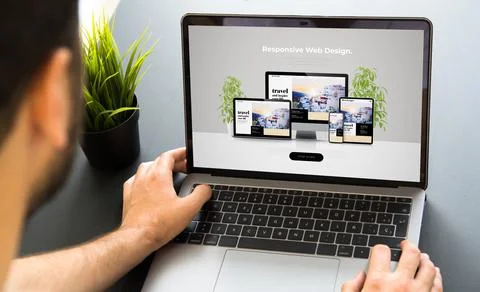 Man working with responsive web design screen laptop Stock Photos