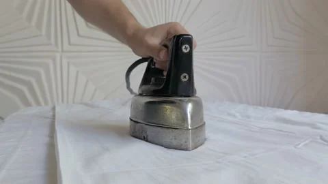 Man Working With Retro Clothes Iron. Stock Footage 104298367