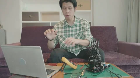 Man Working on Robotics Project at Home Stock Footage 316073981