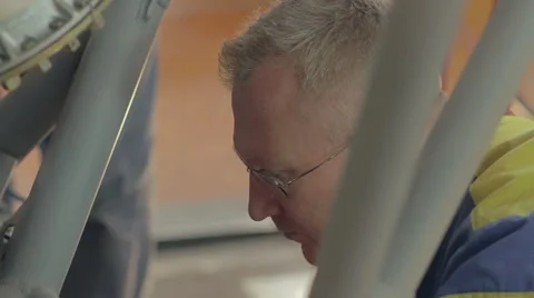 Man is working on a rocket engine Stock Footage 57702893