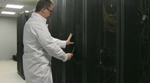 Man working in server room Stock Footage 29930804