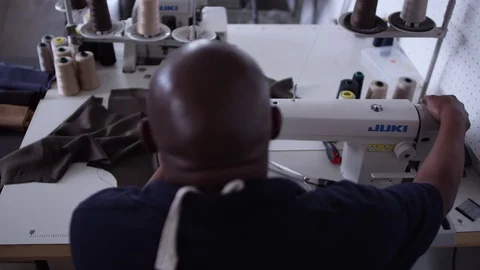 Man Working in a Sewing Factory Stock Footage 104814110