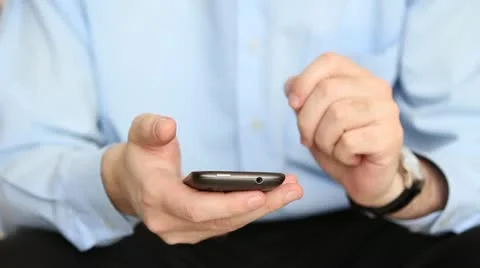 Man working with smartphone Stock Footage 22009433