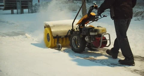 Man working with snow blower Stock Footage 156661406