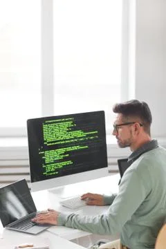 Man working in software develop company Stockfoto's