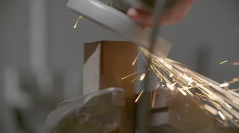 Man working with sparking angle grinder 動画素材 60415724
