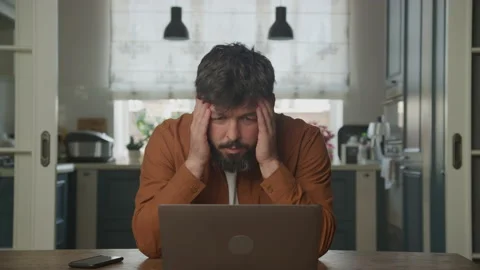 Man working stressed on a computer laptop 動画素材 199307048