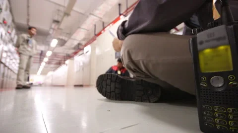 Man working in substation room Stock Footage 55447396