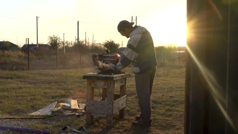Man working at sunset  4K Stock Footage 294048793