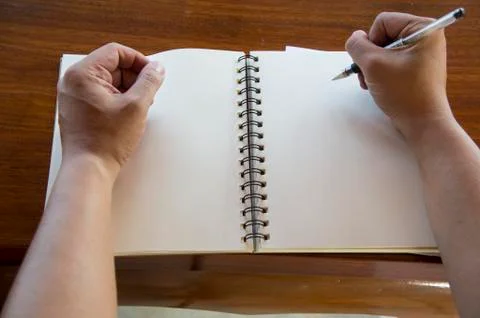 Man working table book pen booklet concept Stock Photos