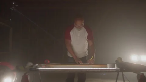 Man Working On Table In Workshop Measuring Stock Footage 270390544