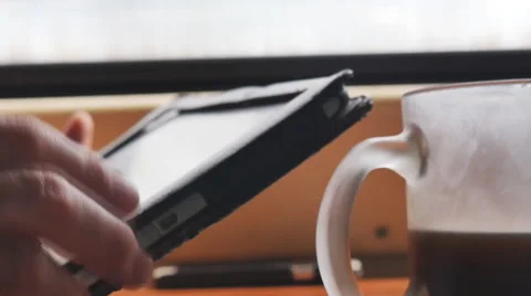 A man working on a tablet in the car Stock Footage 63325656