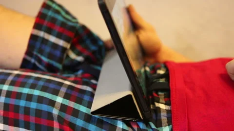 A man working on a tablet computer, close-up Video stock 60423336