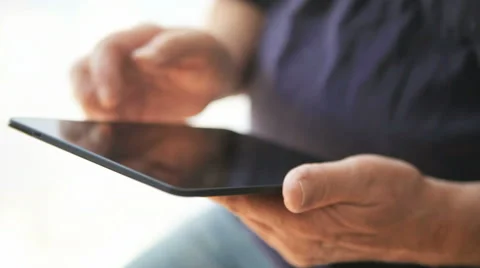 Man working on tablet Stock Footage 55848707