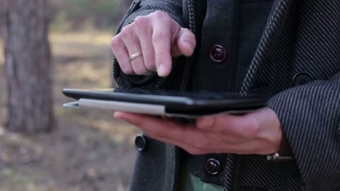 A Man Working on the Tablet Vídeos de archivo 73503896