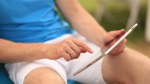 Man Working On a Tablet Stock Footage 90521283