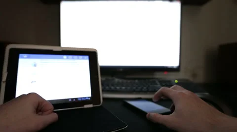 Man working with tablet, mobile device and PC 動画素材 48950778