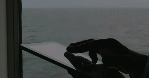 Man working with tablet PC aboard Stock Footage 57139704