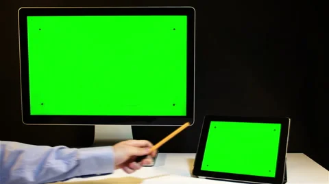 Man Working on the Tablet PC and Display with a Green Screen  at the Workplace. 스톡 동영상 52142952