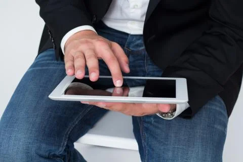 Man working on a tablet pc Stock Photos