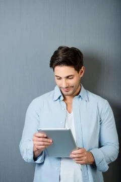 Man working on a tablet-pc Stock Photos