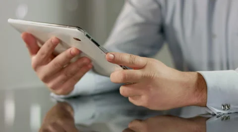 Man working on tablet PC, responding e-mail, typing message text Stock Footage 51493966